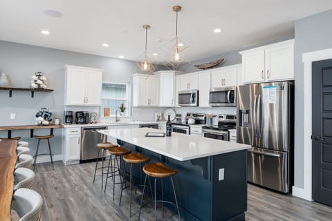 You’ll find barstools for four at the kitchen island – perfect for lunch or a snack, or use these for overflow during large feasts.