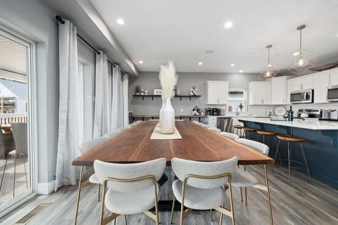 A view of three (of four) areas of dining seating inside the main level (more outside).