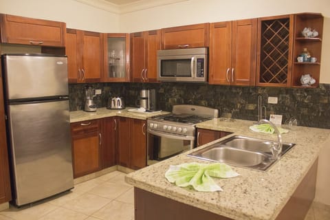 Fridge, cookware/dishes/utensils, dining tables