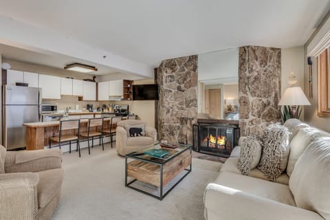 Living room with wood-burning fireplace
