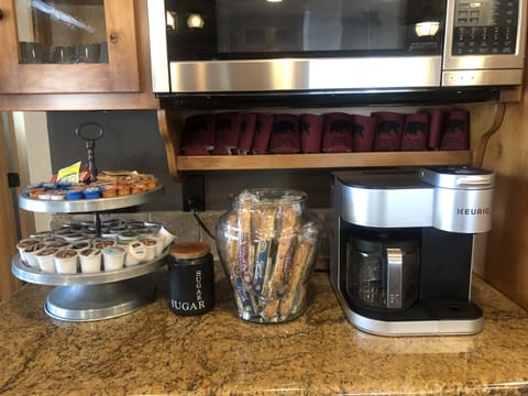 Coffee Bar with Biscotti's and Lake Lodge Koozies. For memories and rebooking!
