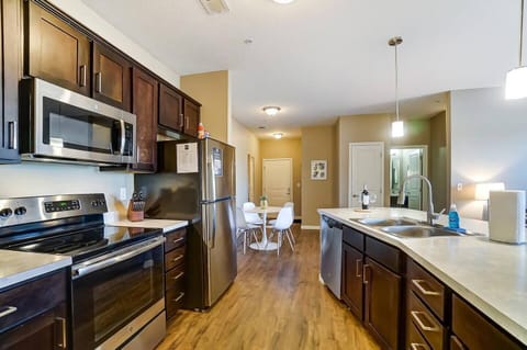 Spotlessly clean and well stocked, this kitchen feels more like a home than an apartment. :)