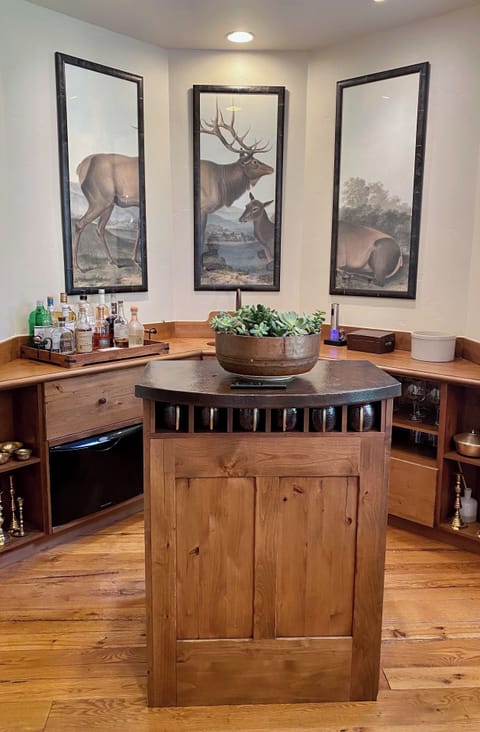 Bar with drink refrigerators in dining room