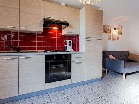 Cabinetry, Furniture, Countertop, Sink, Tap, Building, Kitchen Stove, Home Appliance, Plumbing Fixture, Interior Design