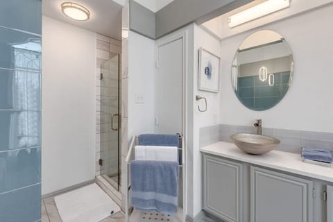 Combined shower/tub, hair dryer, towels, soap