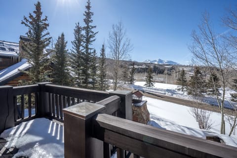 2.04-country-club-estate-mountain-village-living-room-balcony-winter