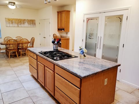 The kitchen is fully equipped with every gadget needed to make a gourmet meal