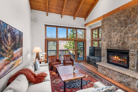 Relax in the spacious living area and enjoy the view, gas fireplace and flat screen TV.