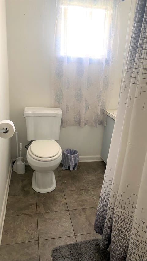 Combined shower/tub, hair dryer, towels, soap