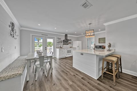 2nd fl main living open concept, kitchen & dining. Front & back balcony access. 