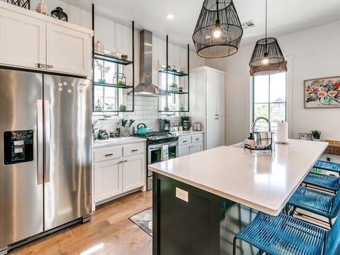 Kitchen Fully Stocked with Cookware and Dishes
