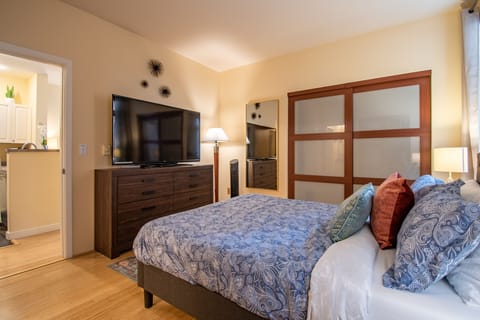 Second Bedroom with a Queen Sized Bed, 2 Closets and 60" Television