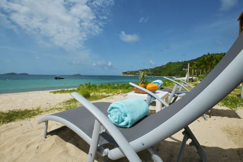 On the beach, sun loungers, beach towels