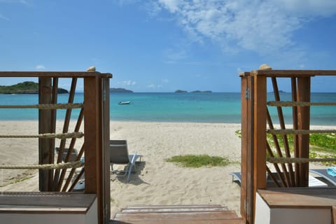 On the beach, sun loungers, beach towels