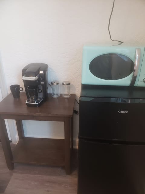 Fridge, microwave, coffee/tea maker, paper towels