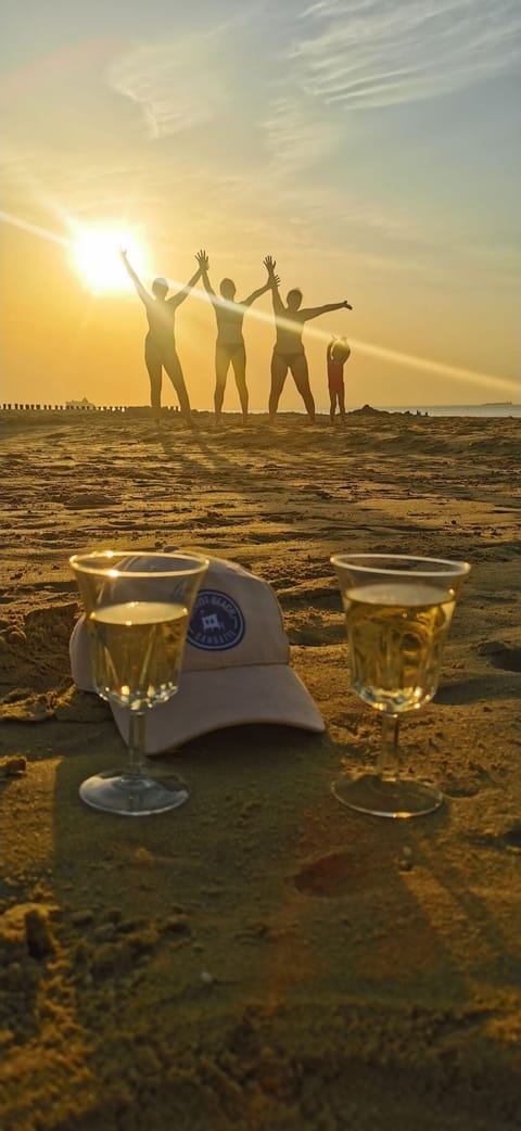 On the beach, sun loungers, beach towels