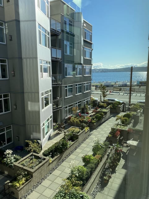 Deck overlooks garden and the Seattle waterfront.  3rd floor of 5 floor complex 