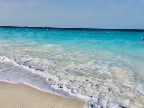 On the beach, beach towels