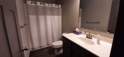 Combined shower/tub, hair dryer, towels, soap