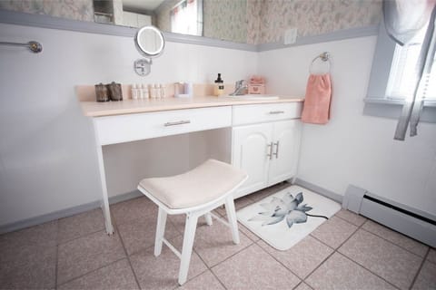 Combined shower/tub, hair dryer, towels, soap