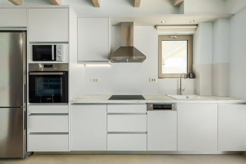 A fully equipped kitchen for culinary creations.