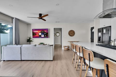 Enjoy entertainment on the flat-screen TV while lounging in a cozy atmosphere.