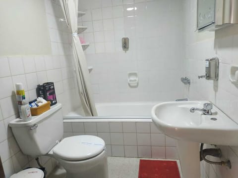 Combined shower/tub, hair dryer, towels, soap