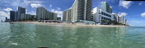 On the beach, sun loungers, beach towels