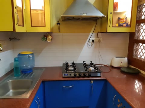 Fridge, stovetop, electric kettle, toaster