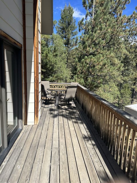 Deck with outdoor dining table and chairs 