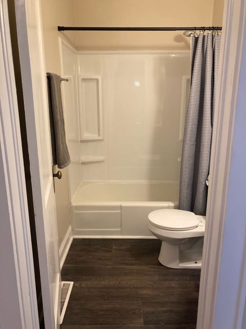 Combined shower/tub, hair dryer, towels, toilet paper