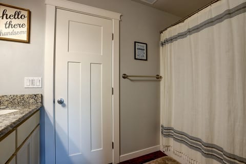 Combined shower/tub, hair dryer, towels, soap