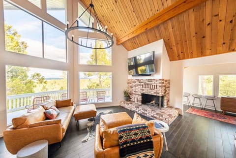 Main Floor: Kitchen, Living Room & Dining — perfect to host with mountains views