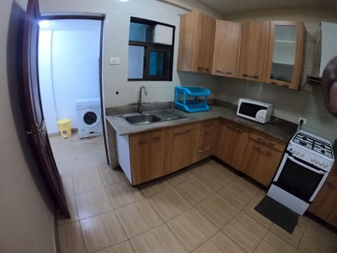 Fridge, microwave, cookware/dishes/utensils