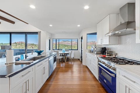 Stainless Appliances Including a 6-Burner Gas Range