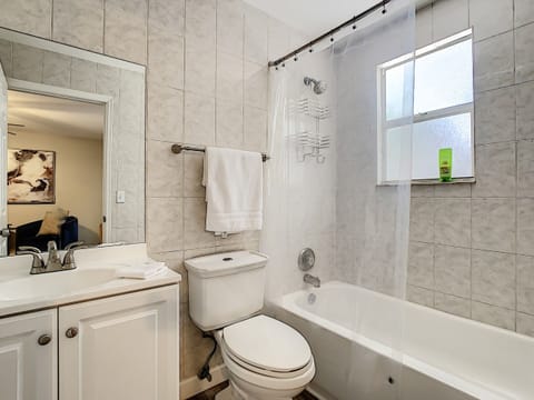 Combined shower/tub, hair dryer, towels, soap