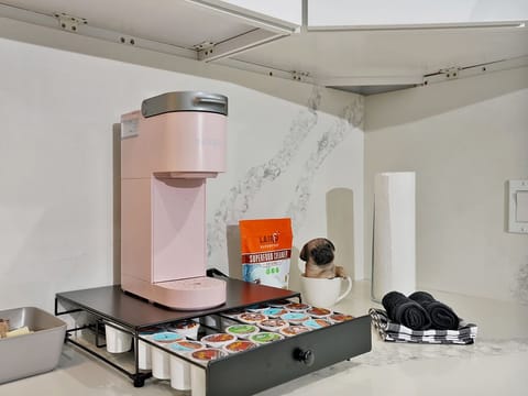 Kuurig coffee maker with full tray of variety of coffee pods