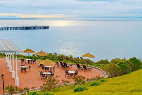 Gather on the ocean-view terrace for sunset drinks together.