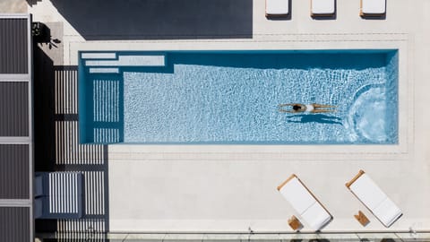 Sophisticated pool surroundings offering a sense of tranquility.