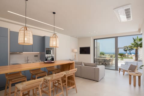 The rough-luxe kitchen is well-equipped for a self-catering stay.