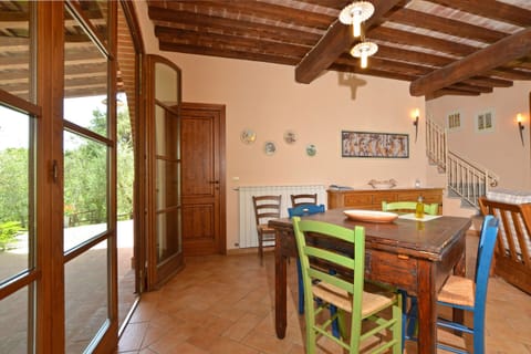 The dining room with kitchen corner in one of the units