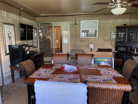 Sunroom is great for entertainment. Unwind  watching tv or play games