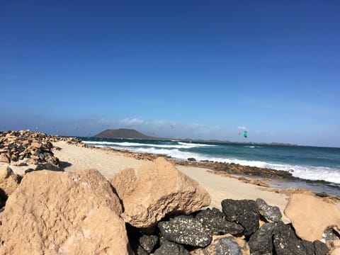 On the beach, sun loungers, beach towels