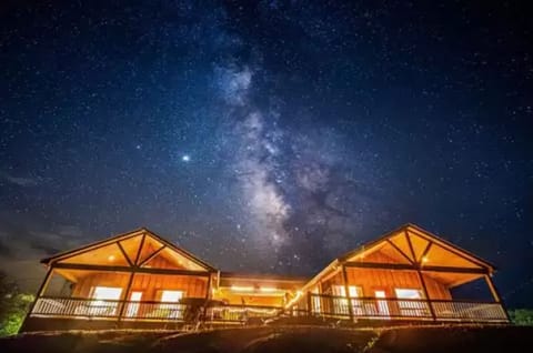 Cabins C + D @ night under the Milky Way! Area voted for the best stargazing! 