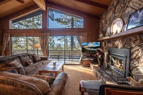 The living room has beautiful views of the lake & mountain. Big outdoor balcony.