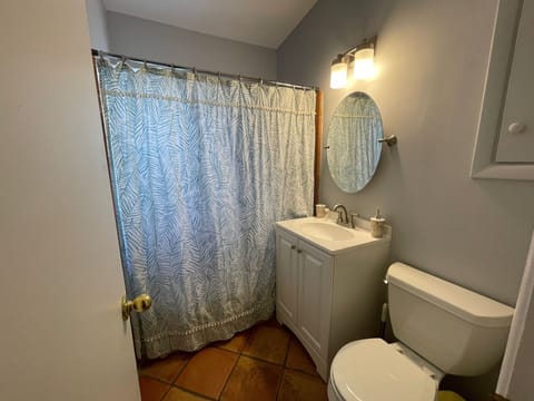 Combined shower/tub, hair dryer, towels, soap