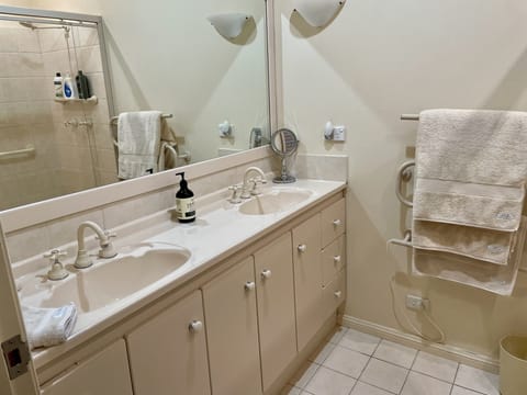 Combined shower/tub, hair dryer, towels, soap