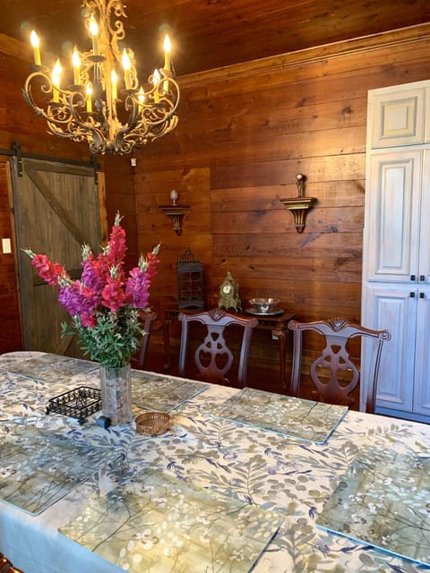 This Dining Room view shows cabinet filled with dishes for entertaining.