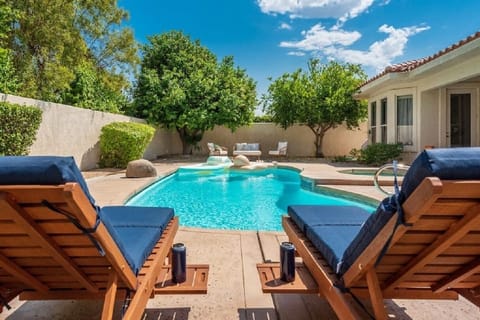 Backyard pool with jacuzzi