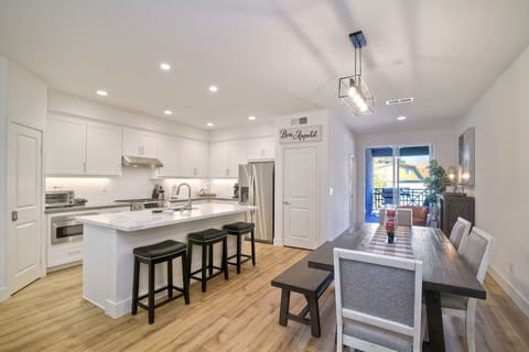 Belly up to the kitchen island, feed the kiddos a snack or lounge and relax  